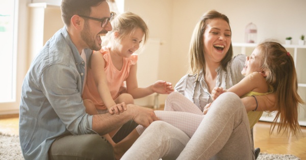 Family spending time in their conservatory living room