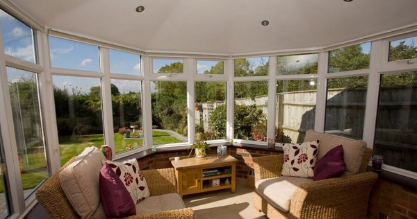 A solid conservatory roof can be a cosy space away from the weather 2