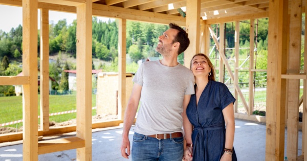 Family with extension under construction which is a more complex solution than conservatory roofing