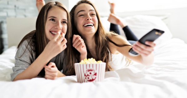 Girls watching tv in a conservatory bedroom 2