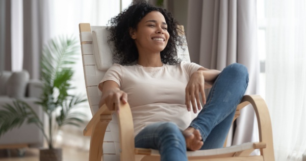 Woman enjoying her new room after a cheap extension 2