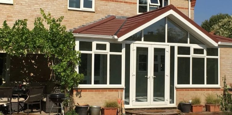 Beautiful red tiled insulated conservatory transformed by Projects4Roofing (1)