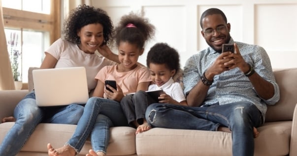 Family spends a hot summer weekend inside their house because their solid conservatory roof does not allow the sun to beat in due to its conservatory insulation.