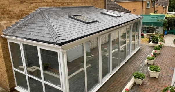 Final installed guardian warm roof conservatory upgrade with velux window installed.