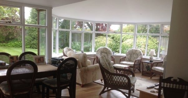 Converted conservatory opened up for open plan living with an insulated guardian warm roof installed by Projects 4 Roofing.