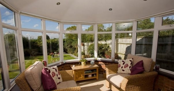 Family converts their conservatory into an insulated useful room by undergoing a conservatory roof conversion. (2)