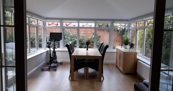 Home office and social life all in one with a converted conservatory. (2)
