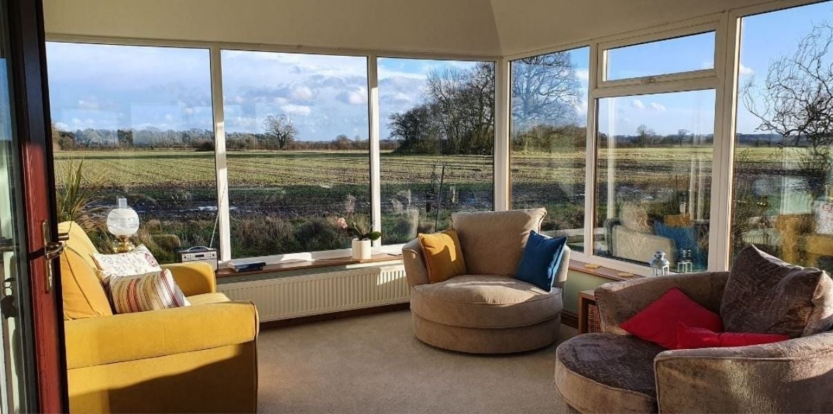 Cozy and warm transformed conservatory with a stunning view