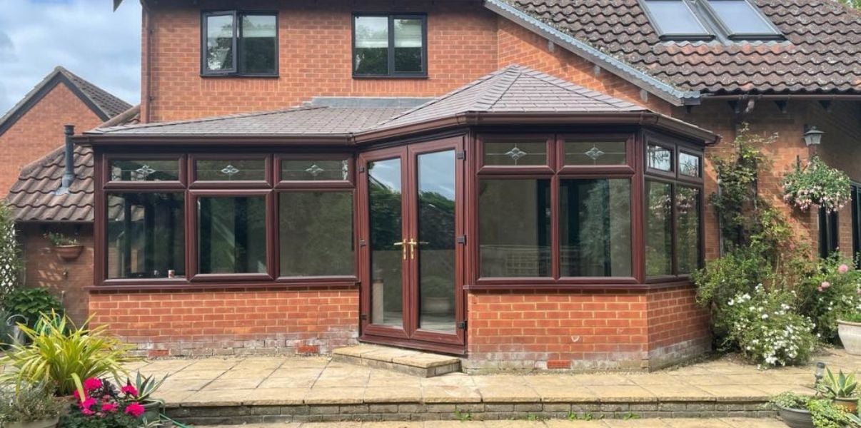 P-shaped solid roof conservatory ready to enjoy this years winter