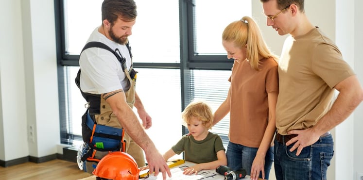 Family talking to P4Rs expert while planning their conservatory roof replacement project