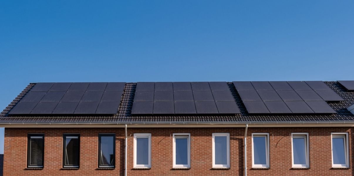 Black solar panels installed on a buildings roof