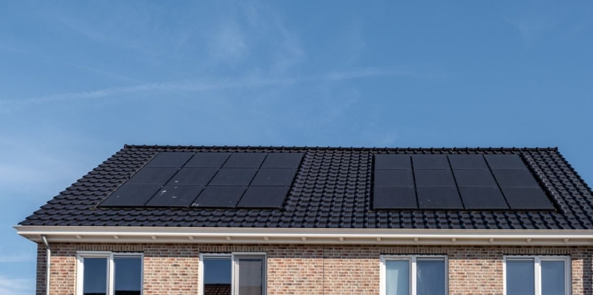 Black solar panels installed on a houses roof