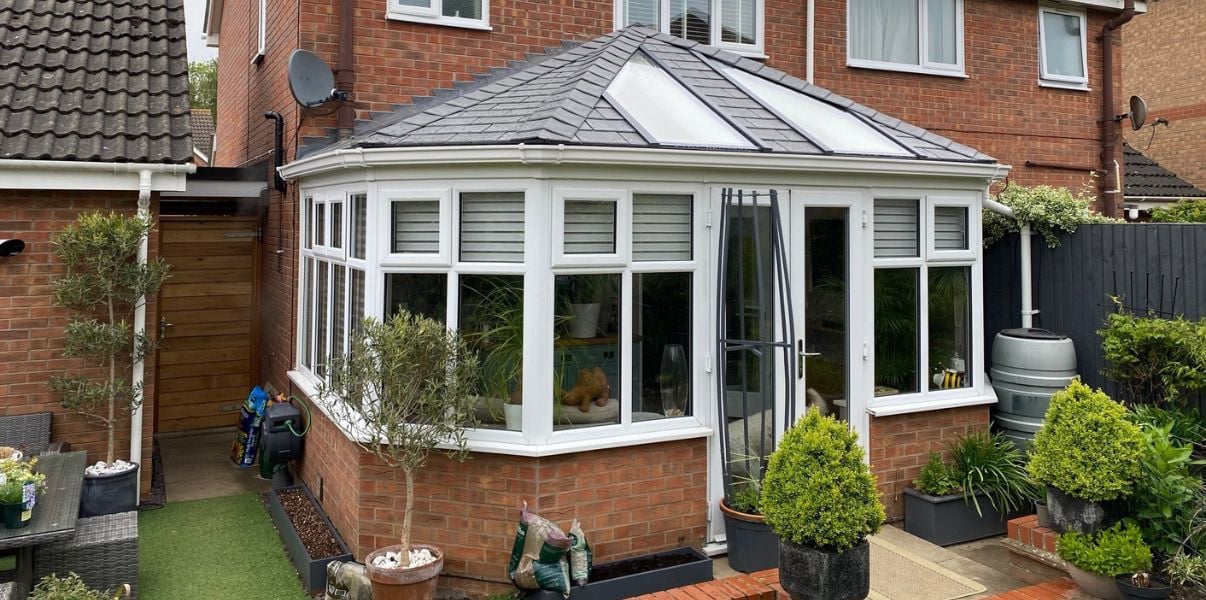 Beautiful solid roof conservatory with Velux windows
