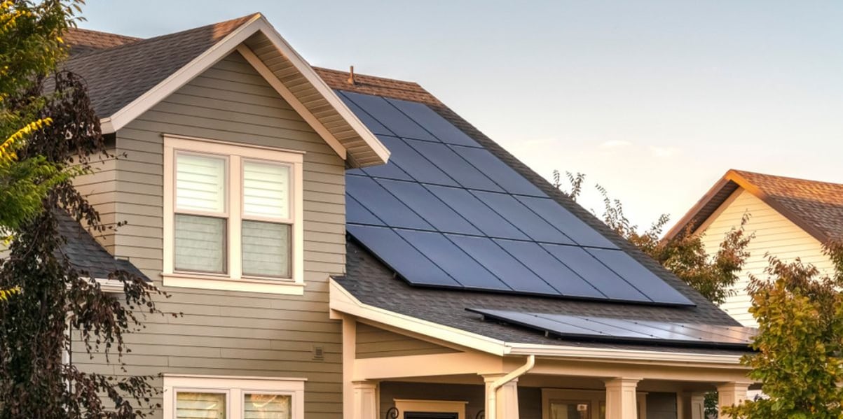 Beautiful house with solar panels on its roof, ready to participate in the SEG scheme