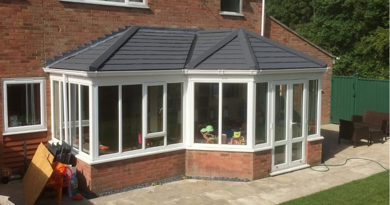 Conservatory after a conservatory transformation with a P Shaped style