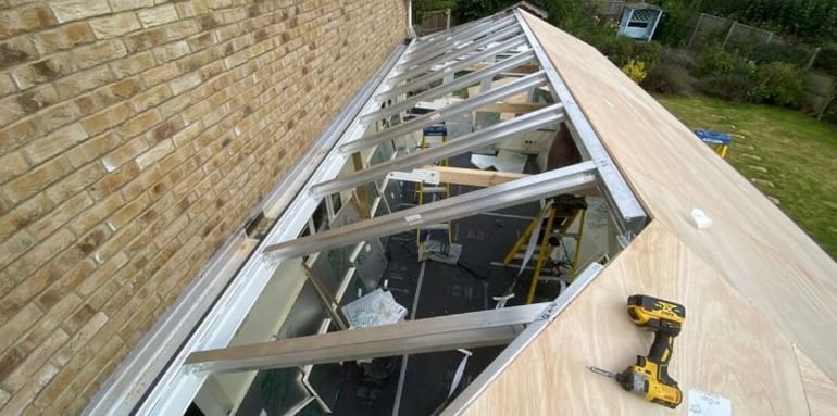 Conservatory roof replacement project in process - framing stage