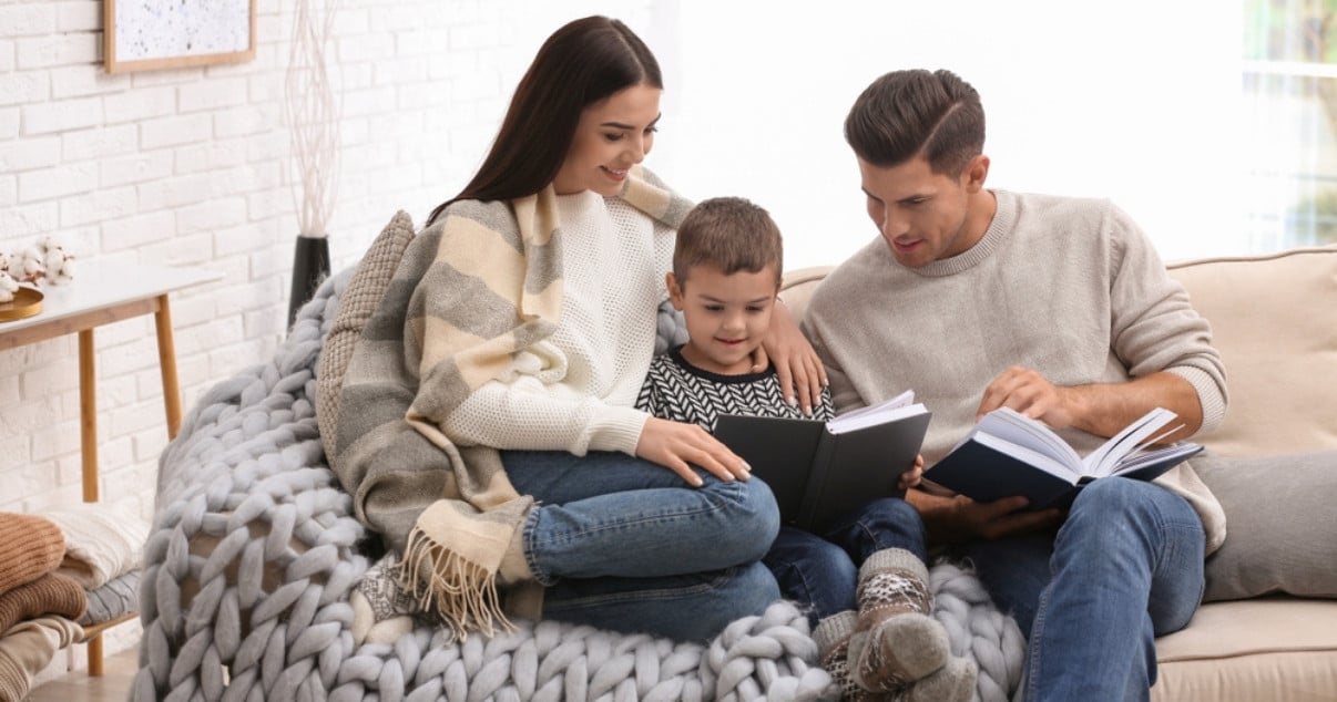 Family spending time together in their conservatory after having a conservatory transformation