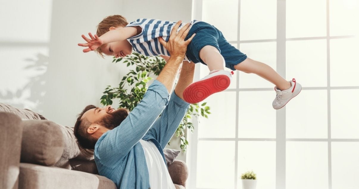 Father and son enjoying their open plan living conservatory (1)