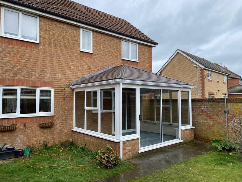 Converted Edwardian conservatory with a solid roof