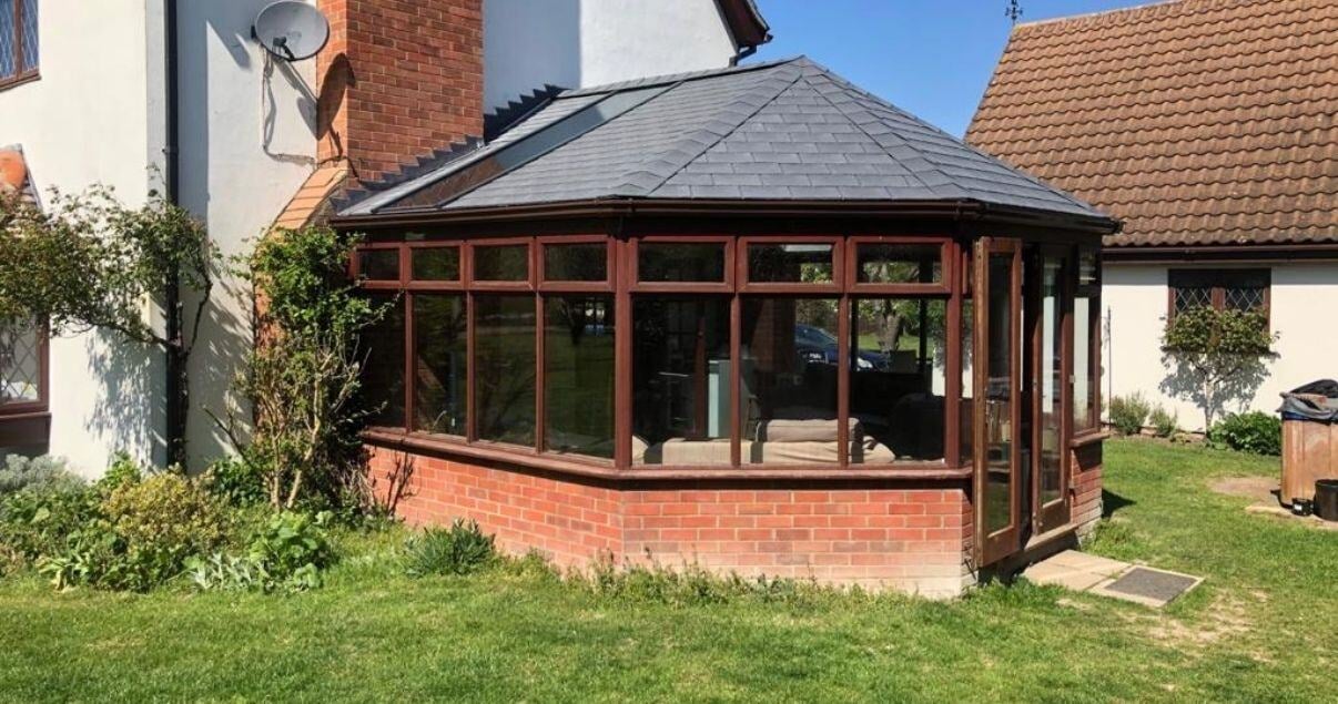 side view of a successful guardian warm roof conservatory roof replacement