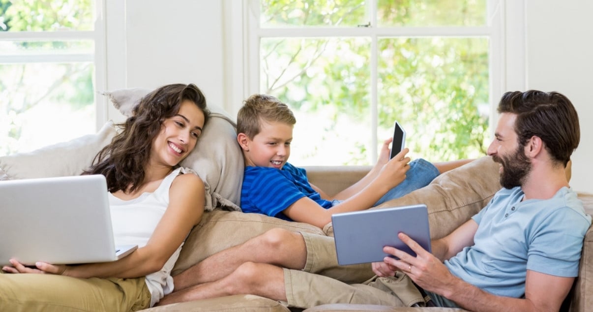 Lovely family enjoying their Conservatory with a Guardian Warm Roof