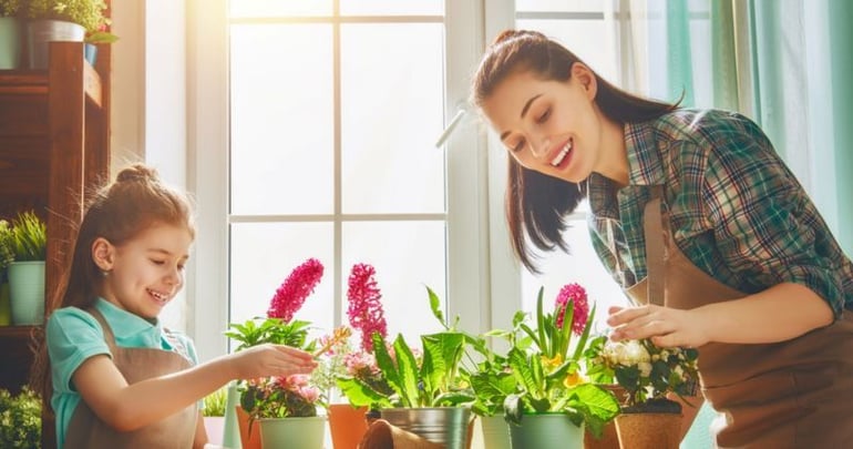 Mother and daughter getting ready for the spring in their newly insulated conservatory