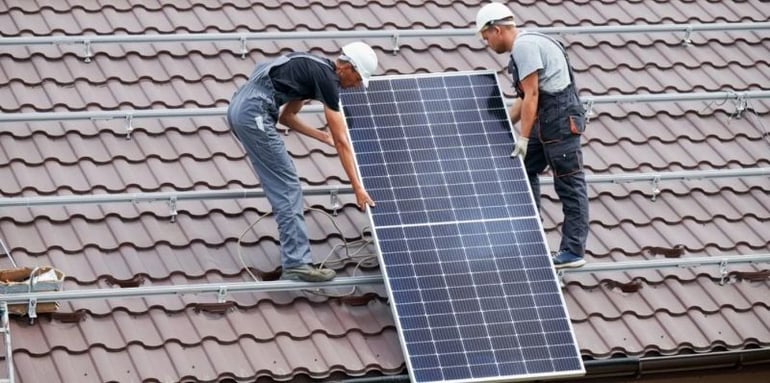 P4Rs team members intalling solar panels