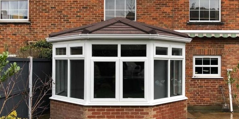Quaint brown tiled conservatory transformed by Projects4Roofing