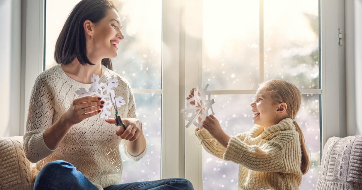 mother and daughter enjoying warm roof conservatory by Projects 4 Roofing in winter